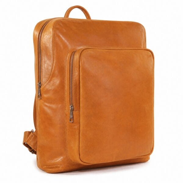 Structured cognac full-grain leather backpack with a large u-shaped front zip pocket, a top grab handle and adjustable leather shoulder straps.