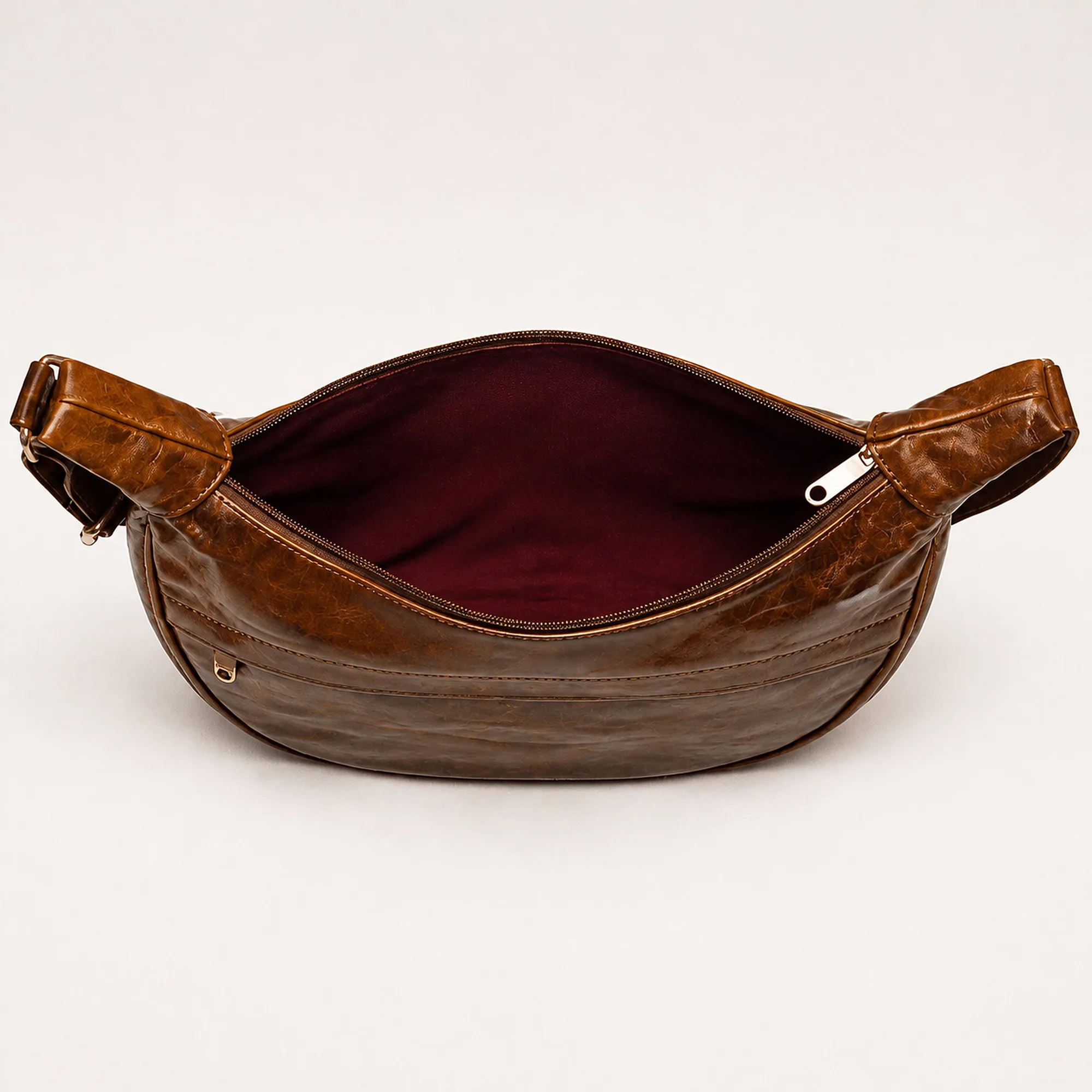 Supplier shot with the top zip open, showing the burgundy lining and the curve of the opening.